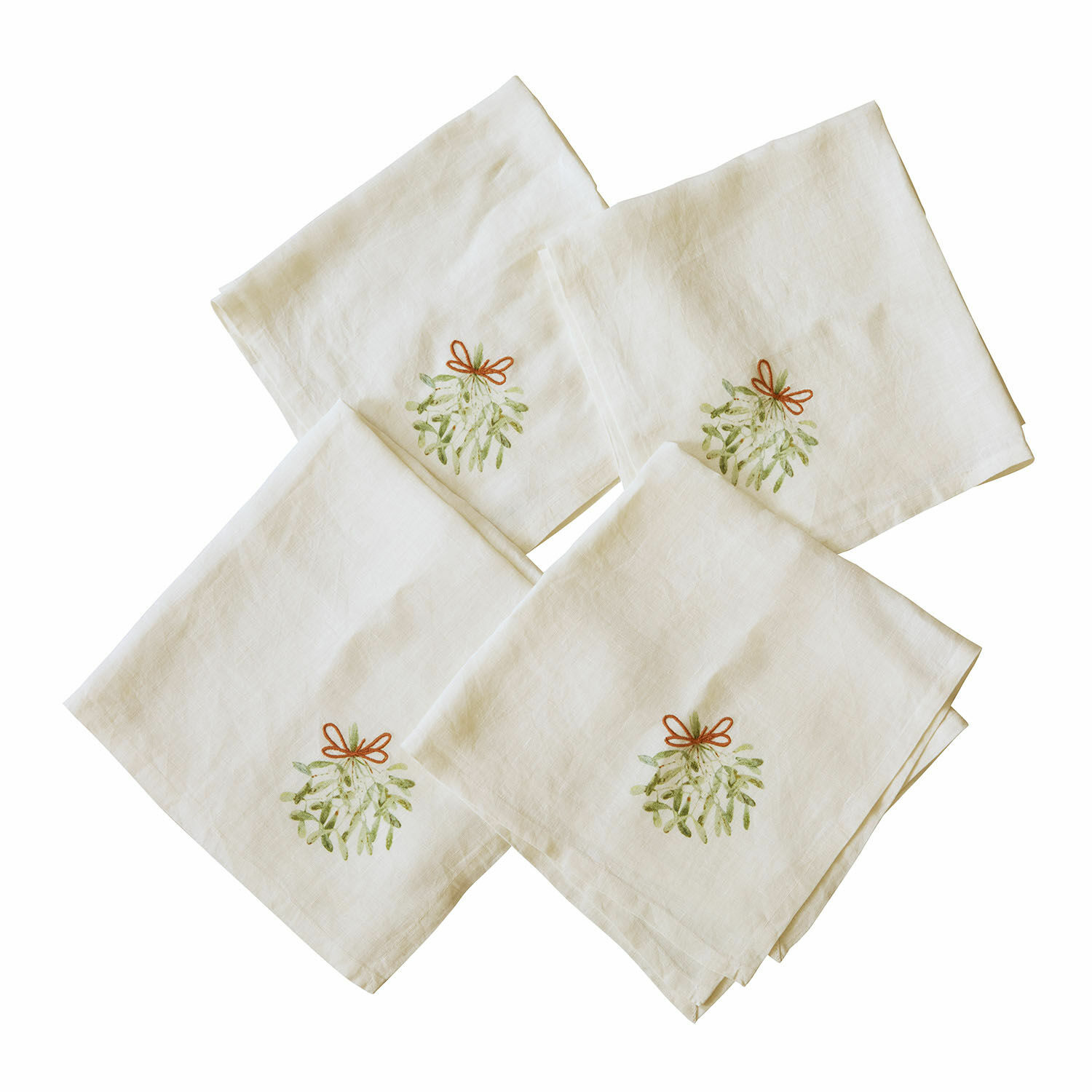 Serviette 4er Set Mistletoe Vier ecrufarbene Leinenservietten mit Mistelzweig-Stickerei und roter Schleife für festliche Tische