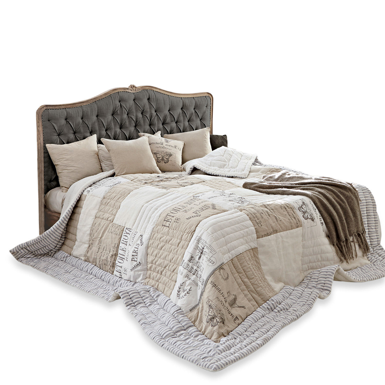 Bett Declaire Bett mit grauem, gepolstertem Kopfteil und beiger Vintage-Steppdecke für das Schlafzimmer