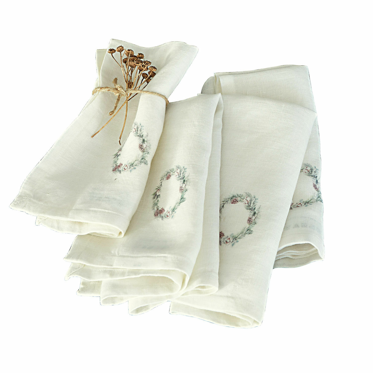 Serviette 4er Set Torge Set aus cremefarbenen Leinenservietten mit zartem Kranzmuster und getrockneten Blumen gebunden
