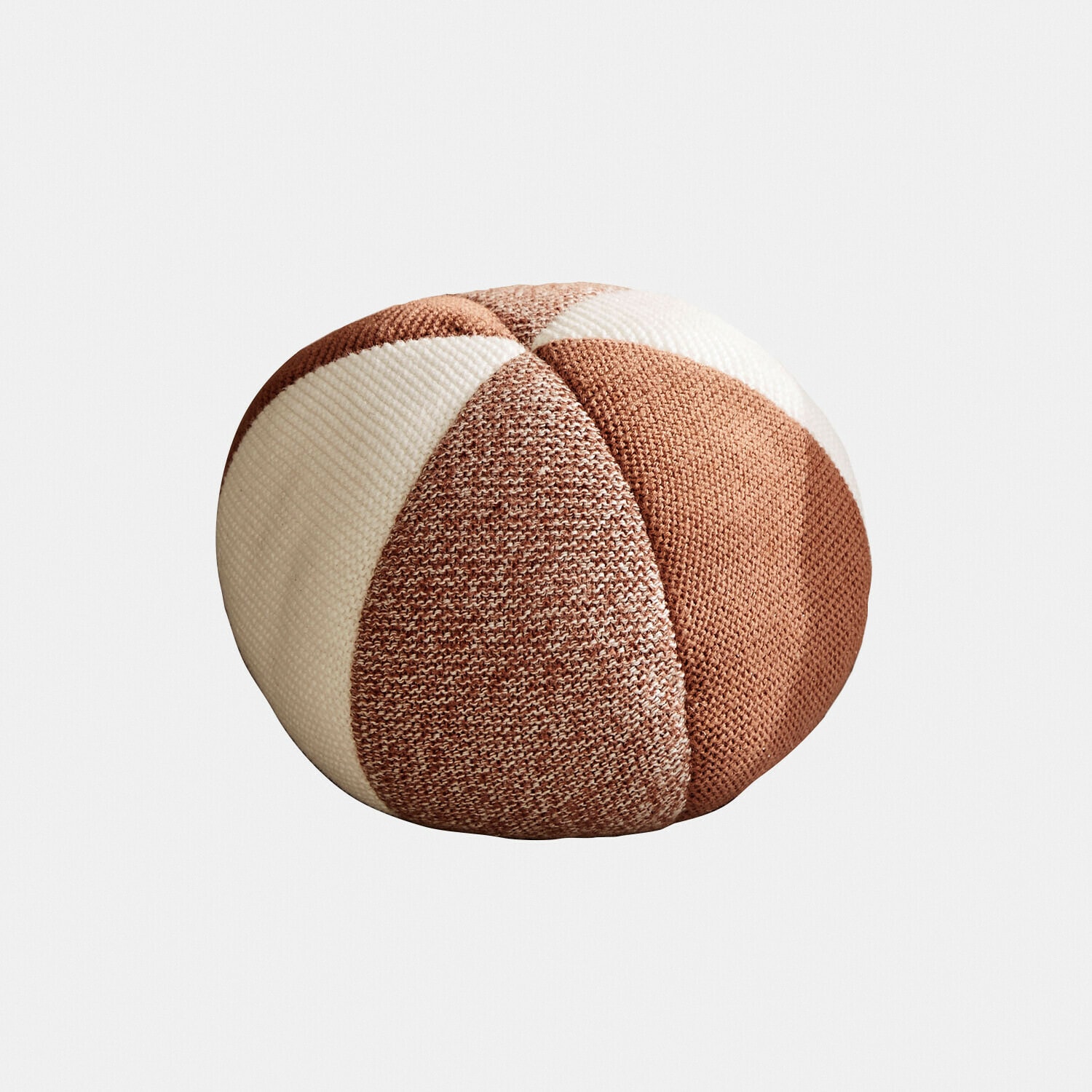 Rundes Strickkissen in Braun- und Cremetönen, ideal für Wohnzimmer und Schlafzimmer