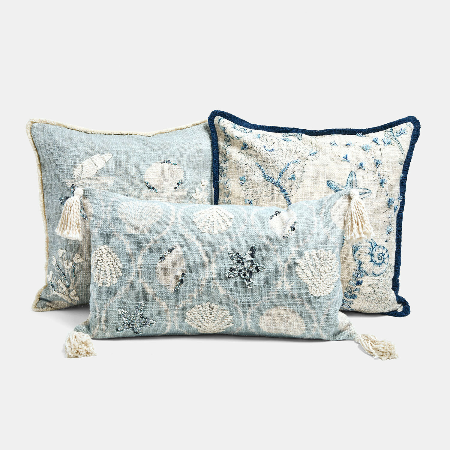 Kissenhülle 3er Set Calerand Drei dekorative Kissen mit Muschel- und Seesternmotiven in Blau- und Cremetönen
