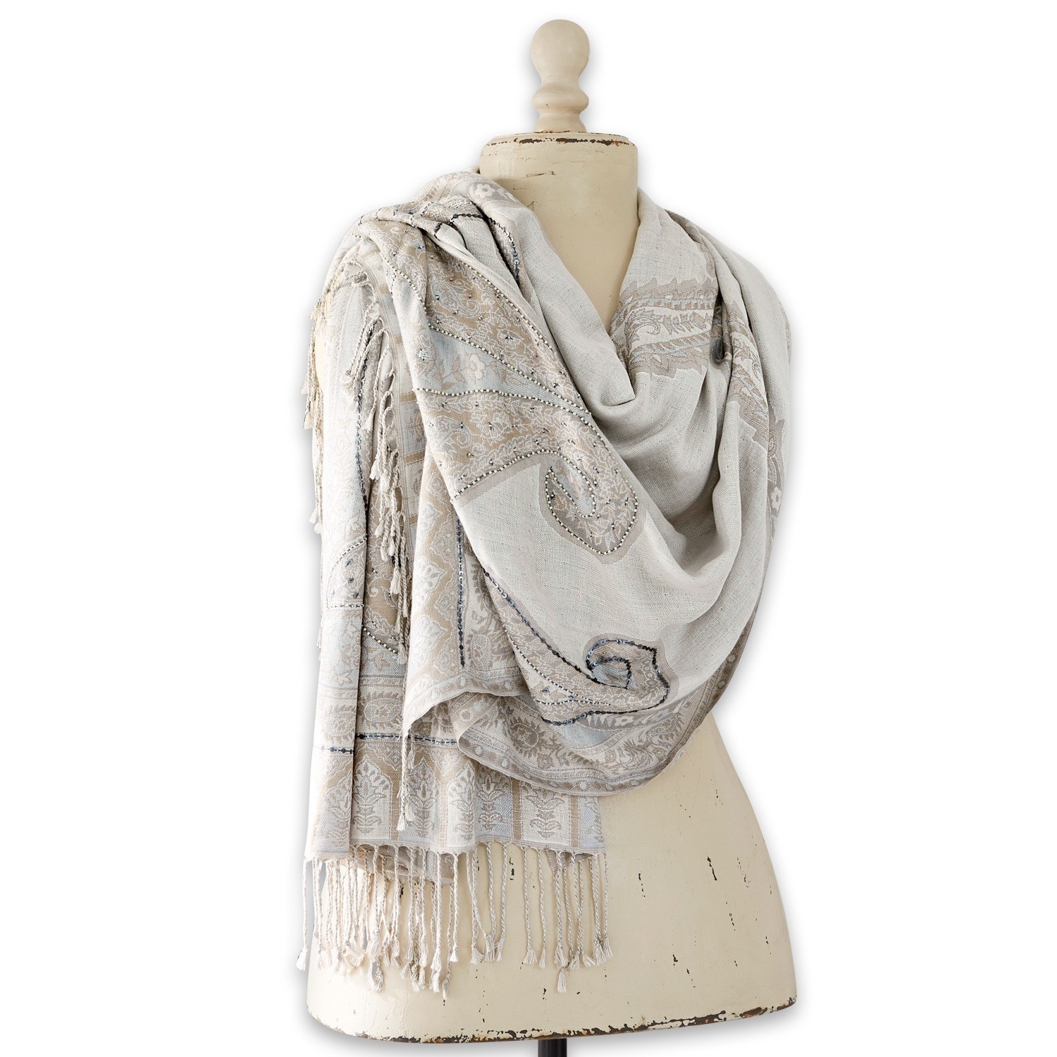 Schal Moyra Beiger Schal mit Muster und Fransen aus weichem Material, modisches Accessoire für kühle Tage.