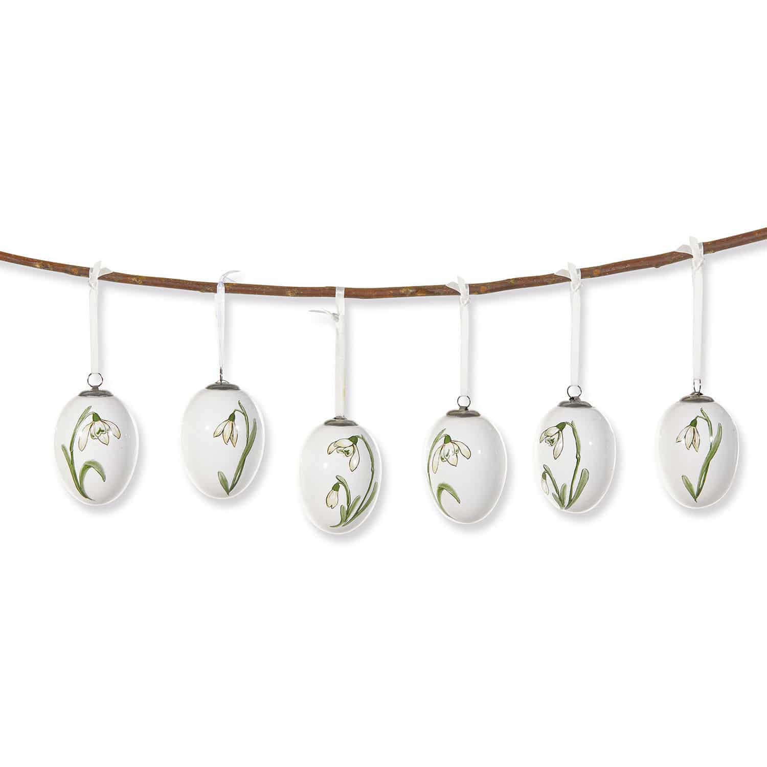 Osterei 6er Set Willmare Set aus sechs weissen Keramikeiern mit grünen Blumen, an einem Ast hängend, Frühlingsdekoration