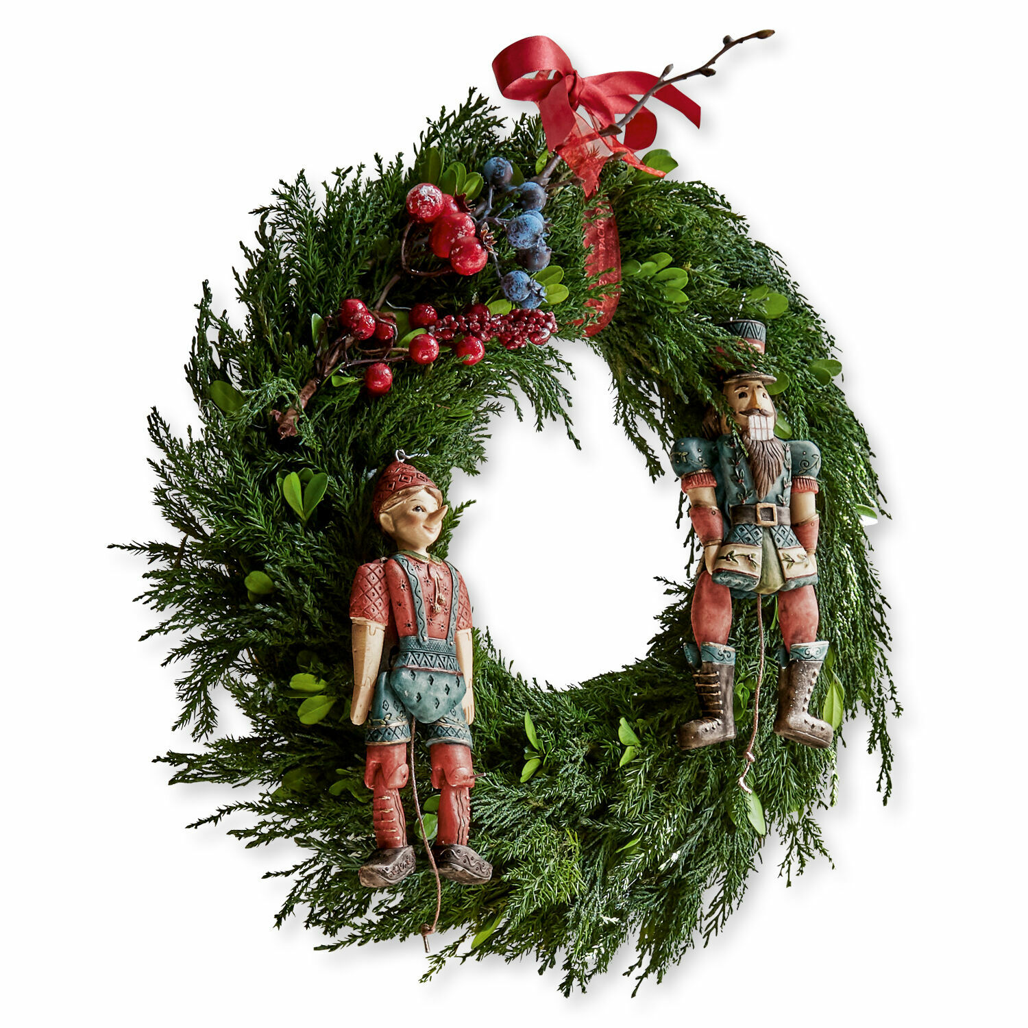 Kranz Dahab Weihnachtskranz aus grünen Zweigen mit roten und blauen Beeren, verziert mit Holzfiguren Nussknacker und Junge