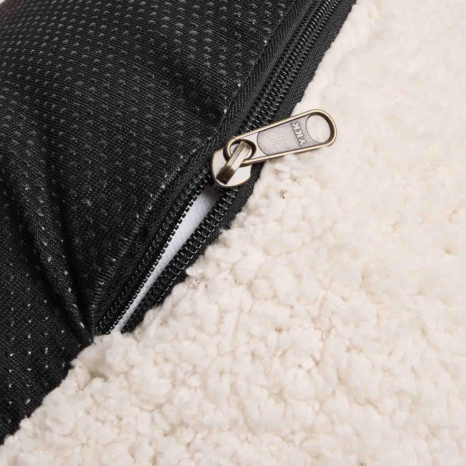 YKK-Reissverschluss an schwarzem, rutschfestem Stoff mit weissem, weichem Fleece-Material