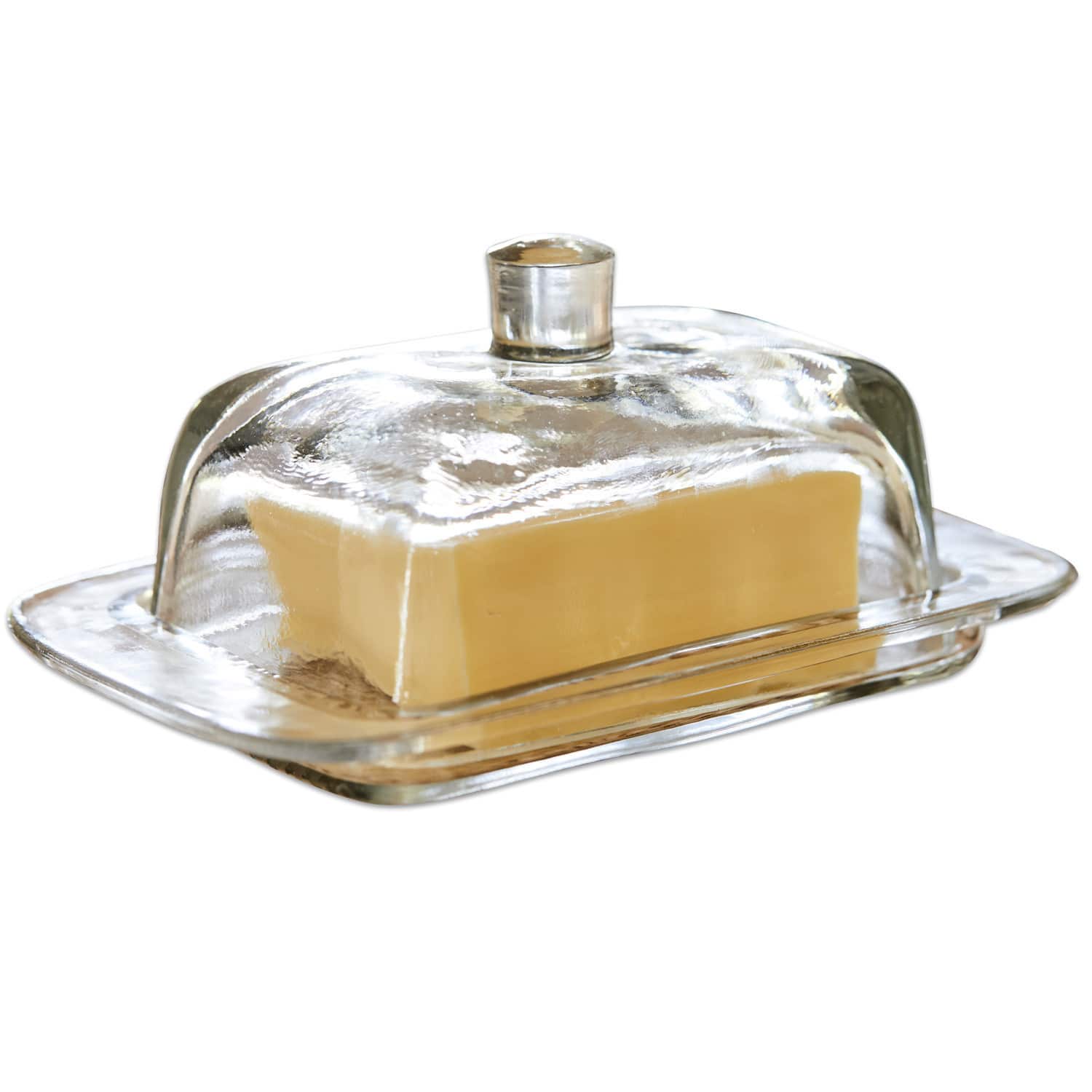 Butterdose Annie Glas-Butterdose mit transparenter Haube und Stück gelber Butter auf weissem Hintergrund
