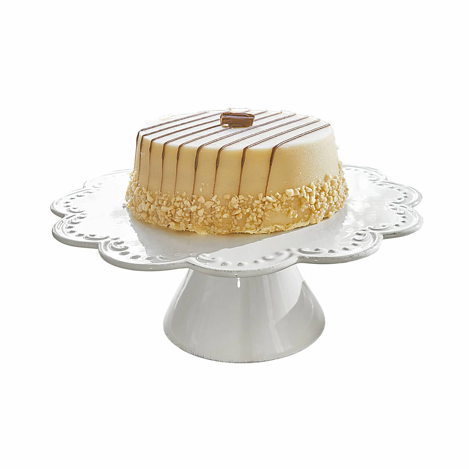 Tortenplatte Fontienne Kuchen auf weissem Keramikständer mit cremigem Zuckerguss und Nussstückchen, eleganter Dessert.