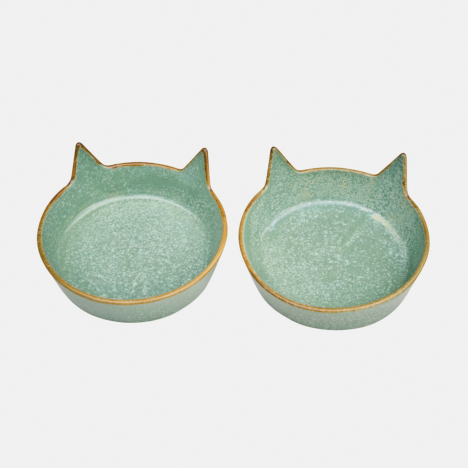 Set mit zwei grünen Keramikschalen in Katzenform mit braunem Rand, dekorative Schalen für Zuhause