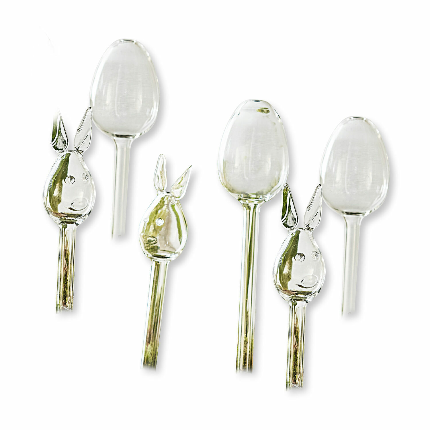 Transparente Glasdekorationen in Hasenkopf- und Eiform für den Garten, frühlingshafte Dekoration