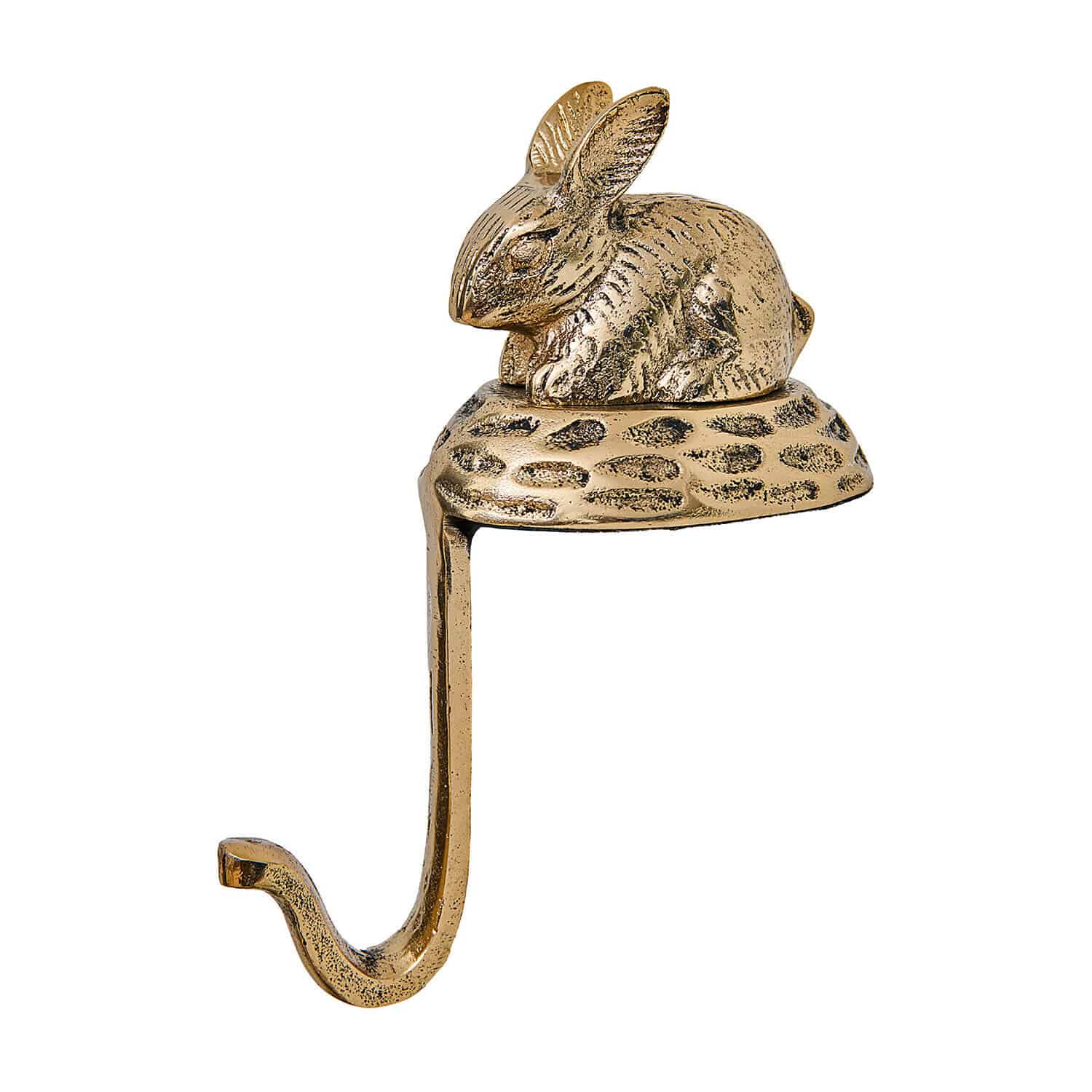 Goldfarbener Metallhaken mit Hasenfigur auf Nest, dekorativer Wandhaken aus Metall