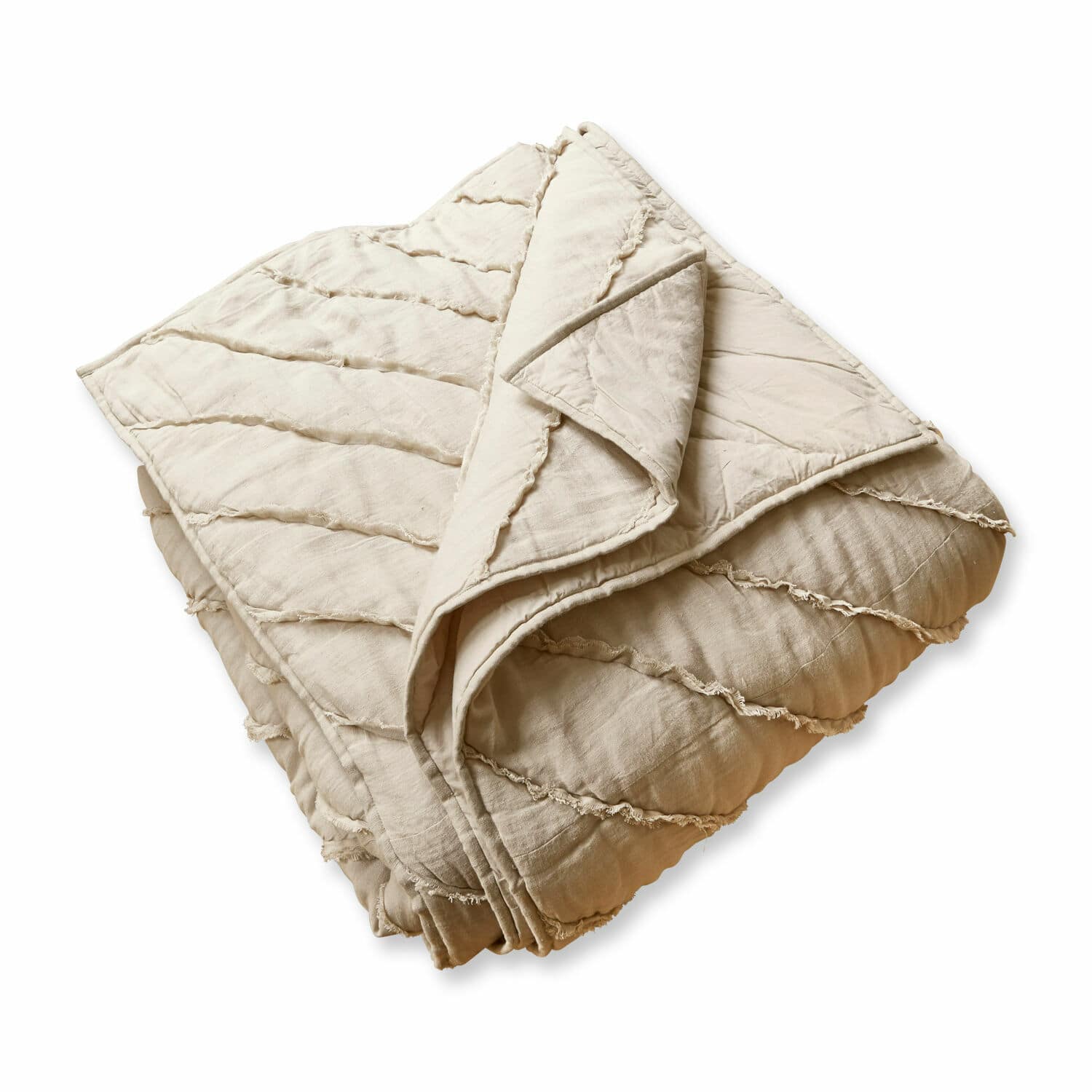 Quilt Eynden Beige gesteppte Baumwolldecke mit weicher Textur, ideal für gemütliche Wohnräume und Dekoration.