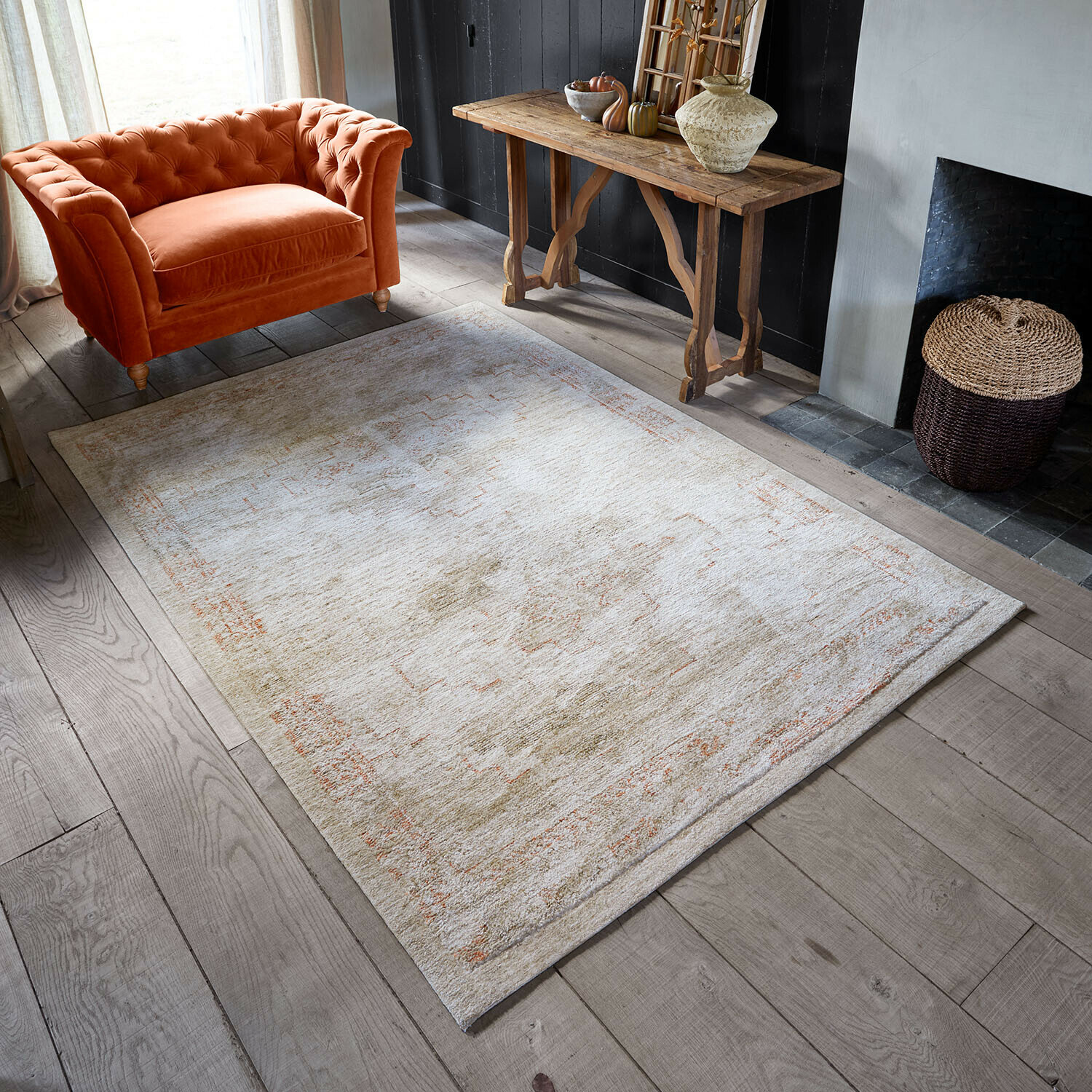 Teppich Soravitto Heller Teppich mit feinem Muster in Beige und Orange auf Holzboden in gemütlichem Wohnzimmer