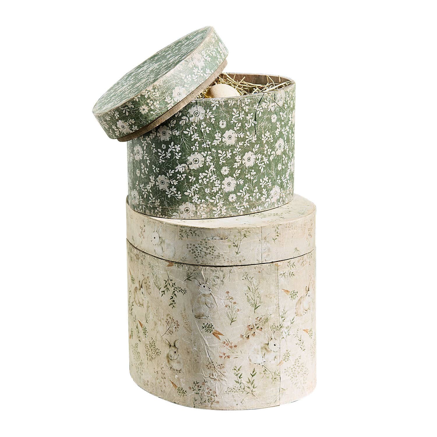 Set mit zwei runden Papierboxen mit Blumen- und Hasenmuster in Grün und Beige als Dekoration